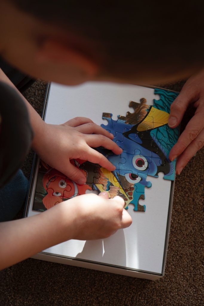 Child working on a puzzle