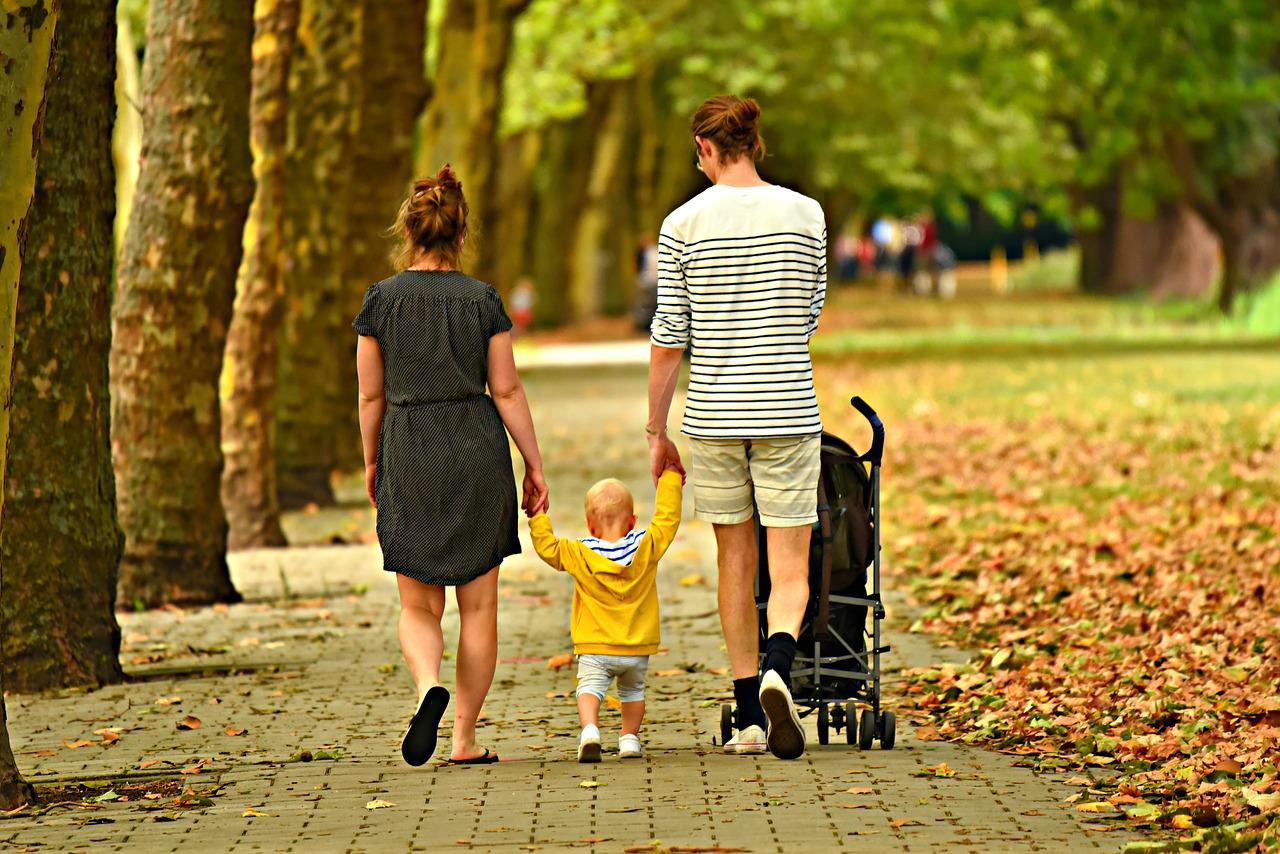 Couple walking with toddler