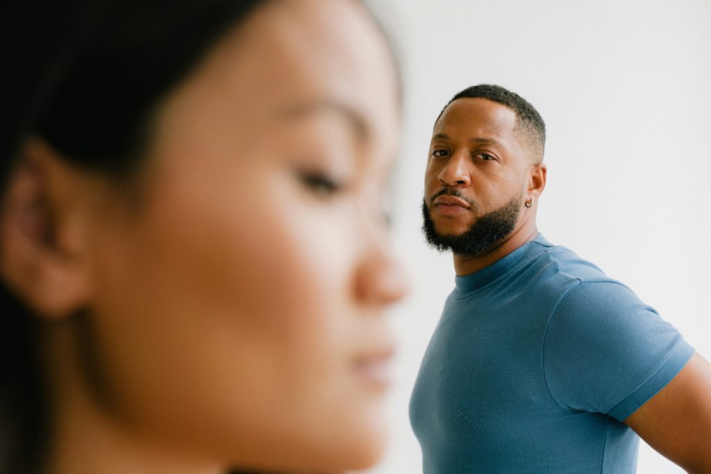 Man and woman looking upset