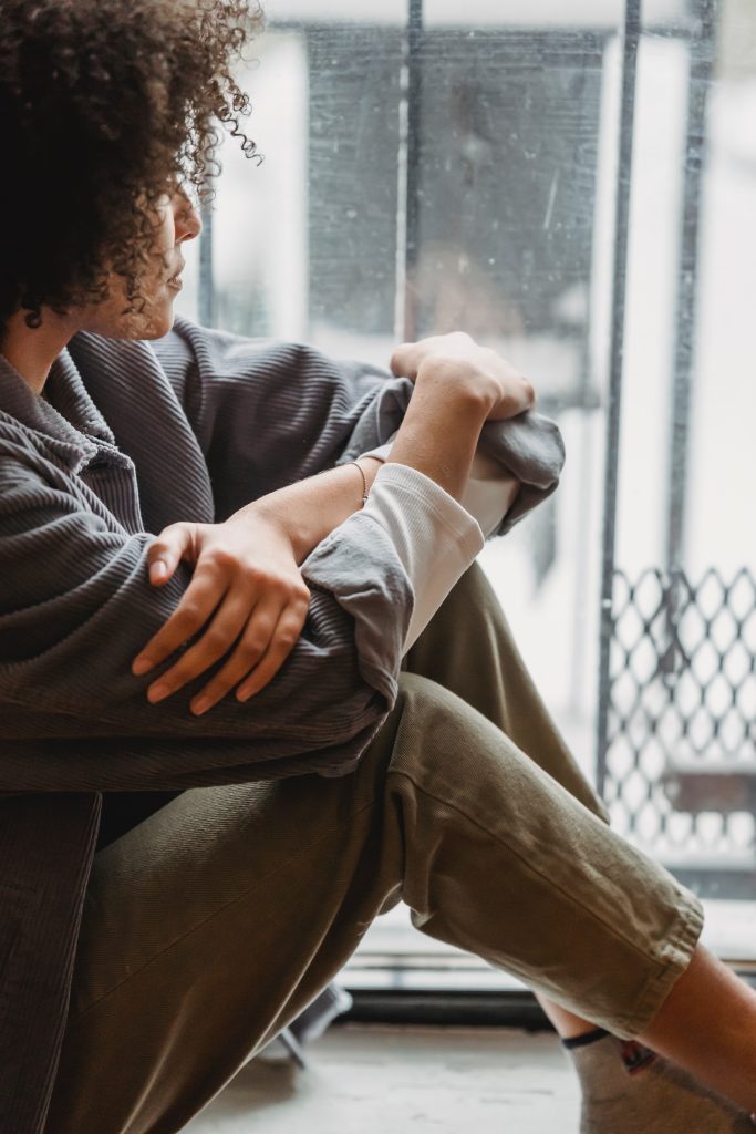 Woman looking out a window