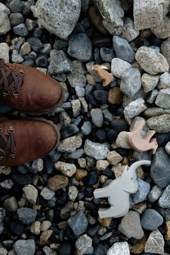 wooded toys in rocks